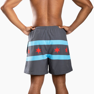 Chi Chi Sport The Lake Effect 5 inch shorts in grey with light blue stripes and red stars, back view on a model.