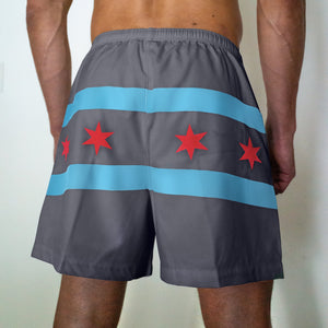 Chi Chi Sport grey athletic shorts with light blue stripes and red Chicago stars, back view on a male model.