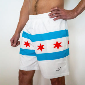 Chi Chi Sport white athletic shorts featuring the Chicago flag design with blue stripes and red stars, 7-inch inseam.