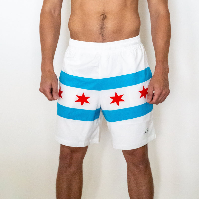 Chi Chi Sport white athletic shorts featuring blue stripes and red stars inspired by the Chicago flag