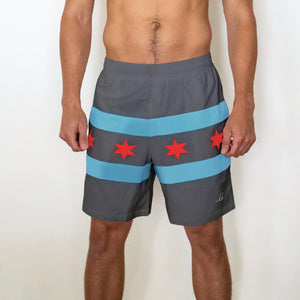 Chi Chi Sport The Lake Effect 7-inch athletic shorts in grey with blue stripes and red Chicago flag star details.