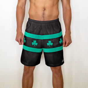 Chi Chi Sport men's 7-inch running shorts in black with green stripes and shamrock print for St. Patrick's Day.