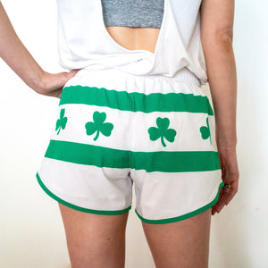 Chi Chi Sport women's running shorts in white with green shamrock print and Chicago flag inspired stripes